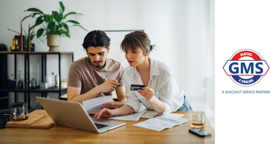 Couple budgeting HVAC costs